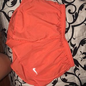 Coral Nike shorts